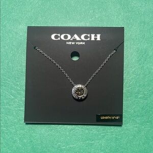 Coach Silver tone Pendant Necklace